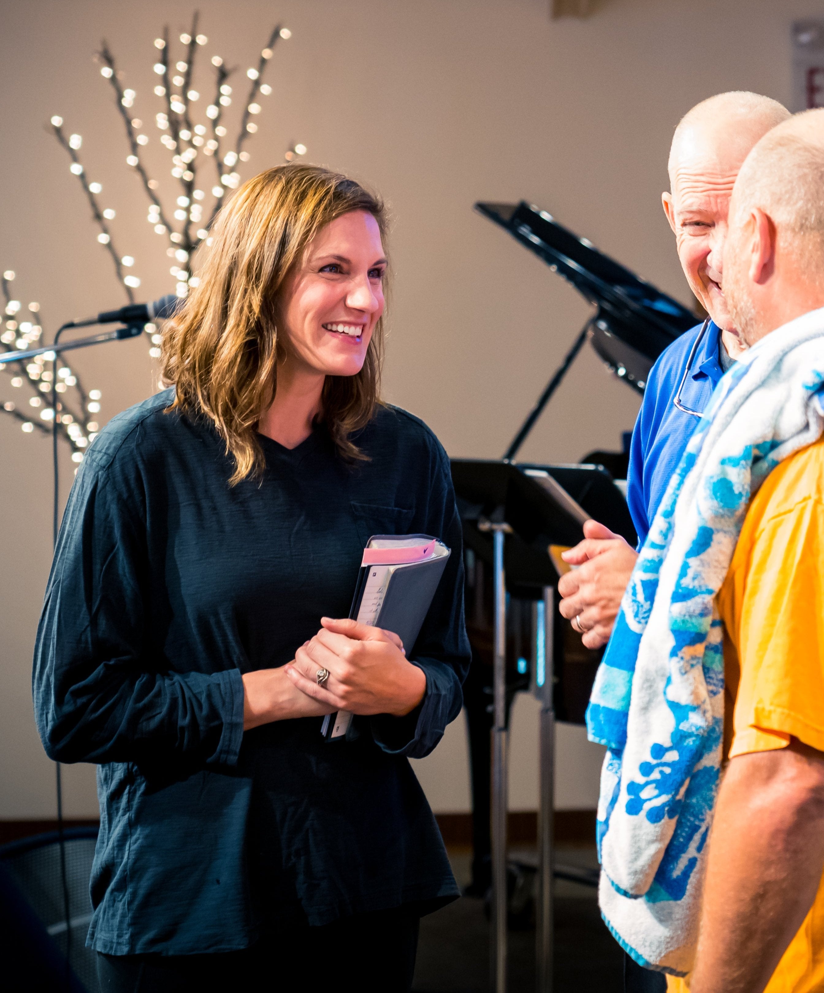 woman smiling at church event